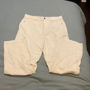 Cream colored corduroy pants.